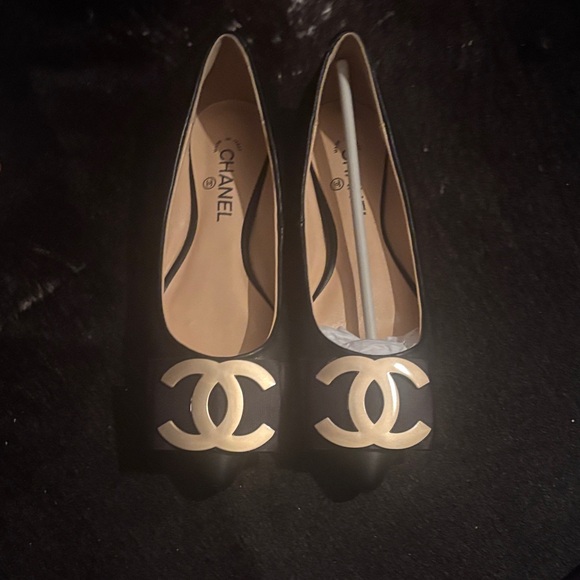 CHANEL Shoes - Chanel Black Flats with Gold Logo